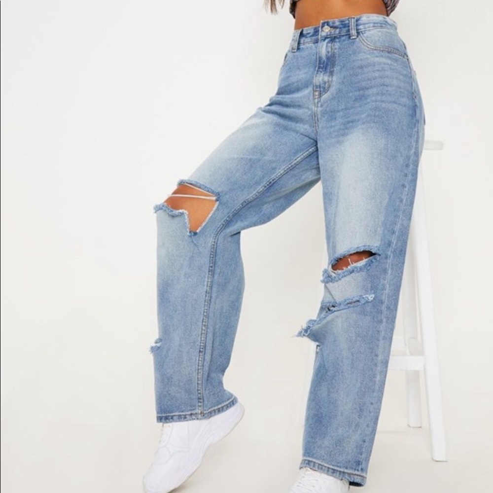 Mid wash baggy low rise distressed boyfriend jeans